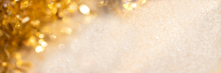 Abstract blur background with gold sparkles particles and bokeh.  Holiday, wedding , cosmetic ...