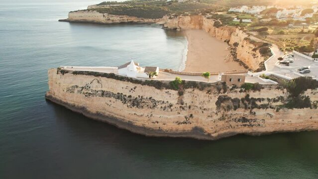 Aerial view of the church Senhora de Nossa, Algarve region at sunrise, Portugal