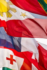 Fototapeta premium Flags of the word waving in the wind. International emblems