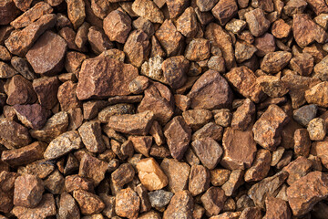 red brown stones, top view, natural texture, natural background