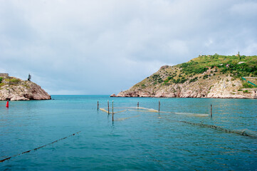 Naklejka premium Balaklava harbour. Landscape with sea rock shore. Ukraine.
