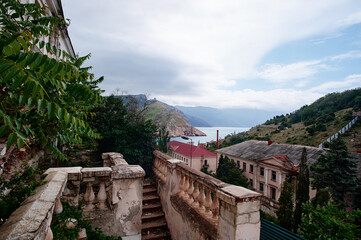 Abandoned old stairs with the sea view.