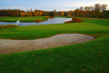 Golf course with a green turf