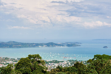 Fototapeta na wymiar Phuket island view point. Beautiful tropical landscape with city on the sea shore.