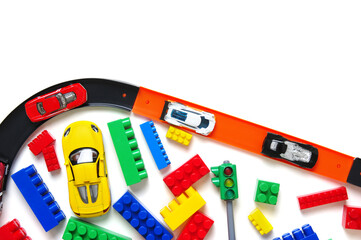 Toy car and racing track isolated on the white