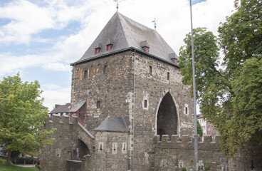Fototapeta na wymiar Aachen july 2022: The Ponttor in Aachen, at times (17th 18th century) also called the bridge gate or gate, is the western of the two north gates of the former outer Aachen city wall