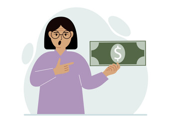A woman holds a large paper bill in his hand. The concept of income, expense, earning or spending money.