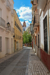 Fototapeta na wymiar Badajoz, Spain, September 10, 2021: A narrow street in the historic center of Badajoz.