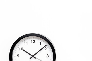 Black and white clock. Round wall clock - time to work concept