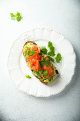 Healthy avocado toast with salmon