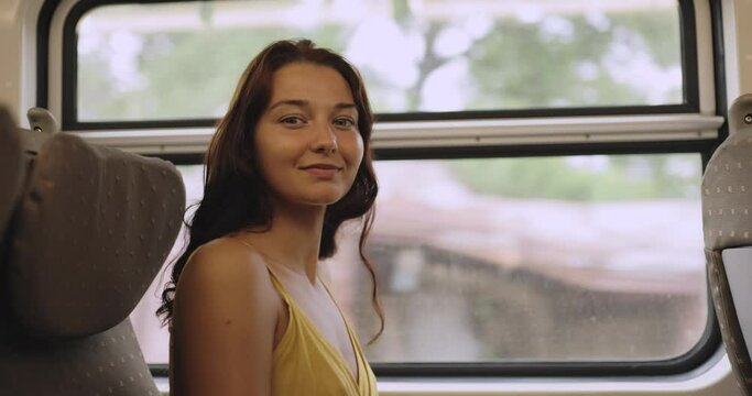 Travel and Exploration of Cheerful Tourist Woman by Train to Famous