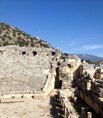 Fototapeta na wymiar Old ruins of an amphitheater off the coast of Turkey