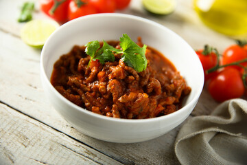 Homemade beef ragout with cilantro and lime