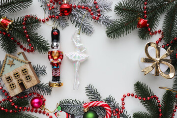 christmas card for children. ballerina and nutcracker figurine on christmas tree