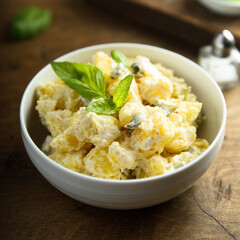 Traditional homemade potato salad with gherkins	