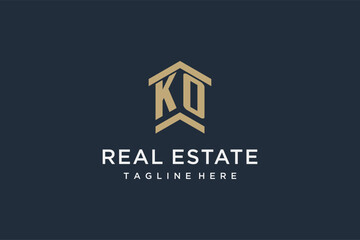 Fototapeta Initial KO logo for real estate with simple and creative house roof icon logo design ideas obraz
