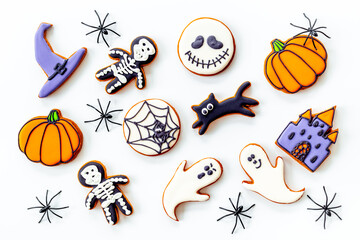 Flat lay pattern of halloween cookies and sweets. Party background