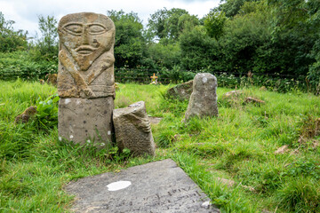 This is a bronze age stone carviing with two faces,called Janus, located In Caldragh Cemetery on...