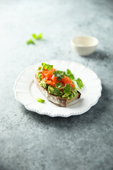 Healthy avocado toast with salmon