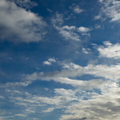 Beautiful nature background. Blue sky with white clouds.