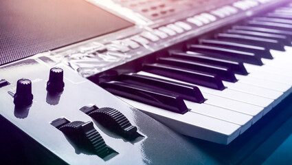 Piano keyboard background was set up in the music room by the windows in the morning to allow the...