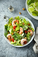 Traditional Caesar salad with shrimps