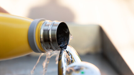 closeup of the mouth of a bottle in a fountain