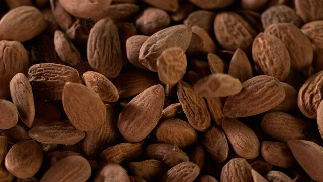 Super Slow Motion Shot of Moving Almonds Background at 1000 fps.