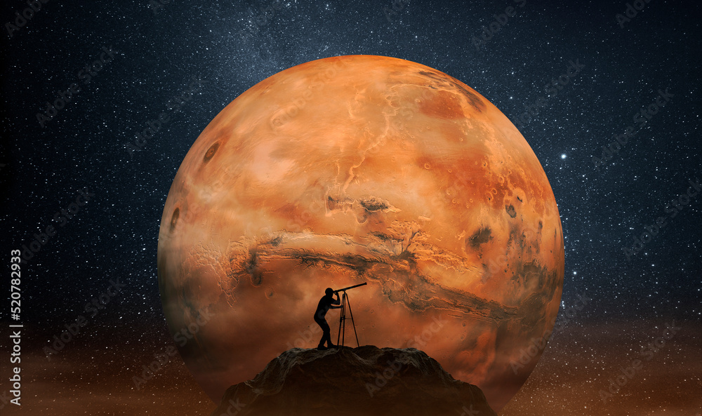 Canvas Prints man observing the mars planet from top of mountain