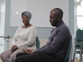 People in group therapy session
