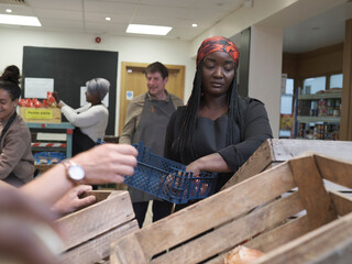 Volunteers working in community food center