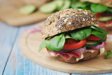 Homemade sandwiches with ham and vegetables	