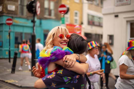 Two women hugging at�LGBT�parade