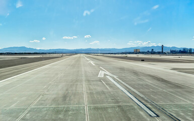 View of McCarran International Airport tarmac though airplane window