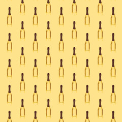 Seamless pattern of golden wine bottles with a brown top on golden background.