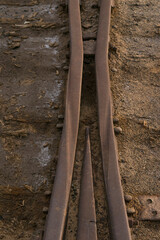 fork of a rusty railroad with salted sleepers