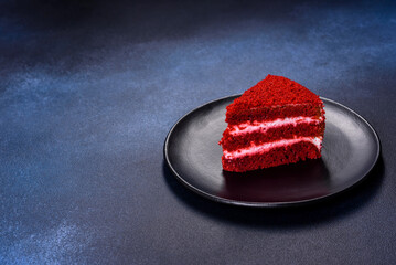 Red velvet cake, classic three layered cake from red butter sponge cakes with cream