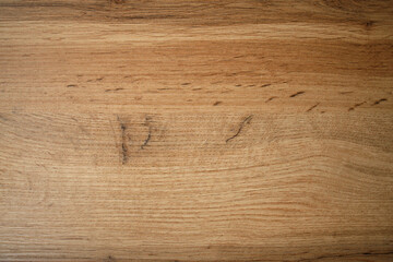 Wooden background texture. Light brown surface of old knotty wood with a natural color