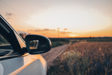 Tourism car on highway with sunset landscape