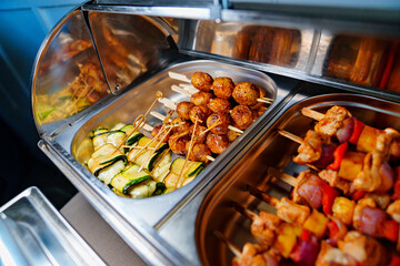 Chafing Dish with assorted grilled meat and vegetables. 