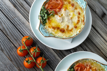 Gourmet Scallop Casserole Baked with Cream and Cheese in a Mediterranean Style. Worth a few bowls.