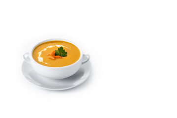 Carrot soup with cream and parsley isolated on white background. Copy space