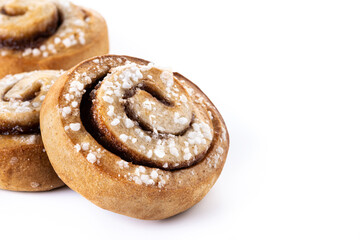 Cinnamon rolls buns. Kanelbulle Swedish dessert isolated on white background. Copy space