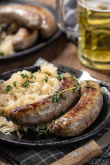 Grilled bratwurst and sauerkraut meal