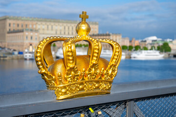 Fototapeta na wymiar Golden Crown of Skeppsholmen Bridge in Stockholm