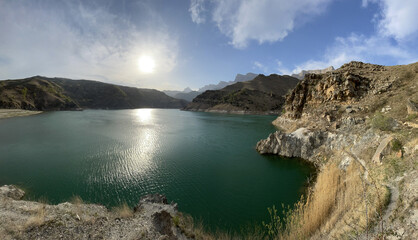 Mountainous lake Gizhgit with emerald water in North Caucasus, Kabardino-Balkaria, Russia