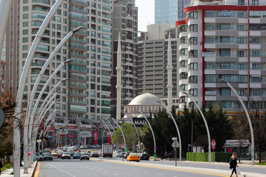 Ankara, Turkey - April 18, 2022: Firdaws Mosque and modern residential buildings in Cankaya Kizilirmak district of Ankara.