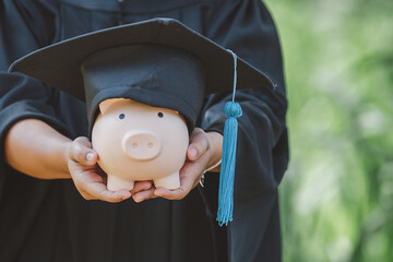 piggy bank With Graduation Cap Money saving concept.