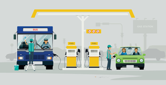 Employees refuel and clean the glass of cars that come to use the service at the gas station.