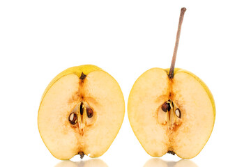 Two halves of a juicy yellow pear, close-up, isolated on a white background.